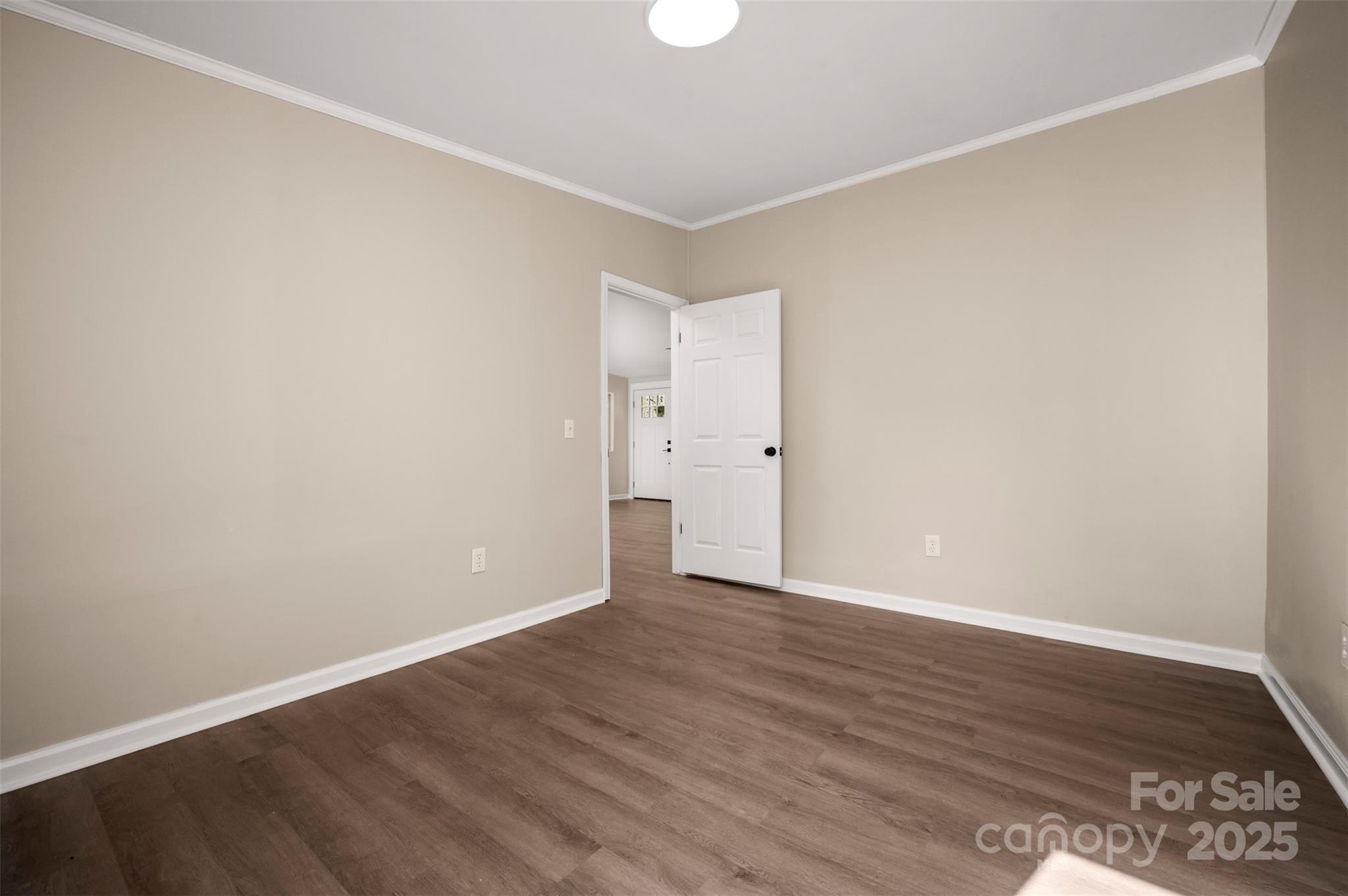 3114 Bostic Sunshine Highway Bostic, NC 28018 - Photo 16 of 48 a view of an empty room with wooden floor