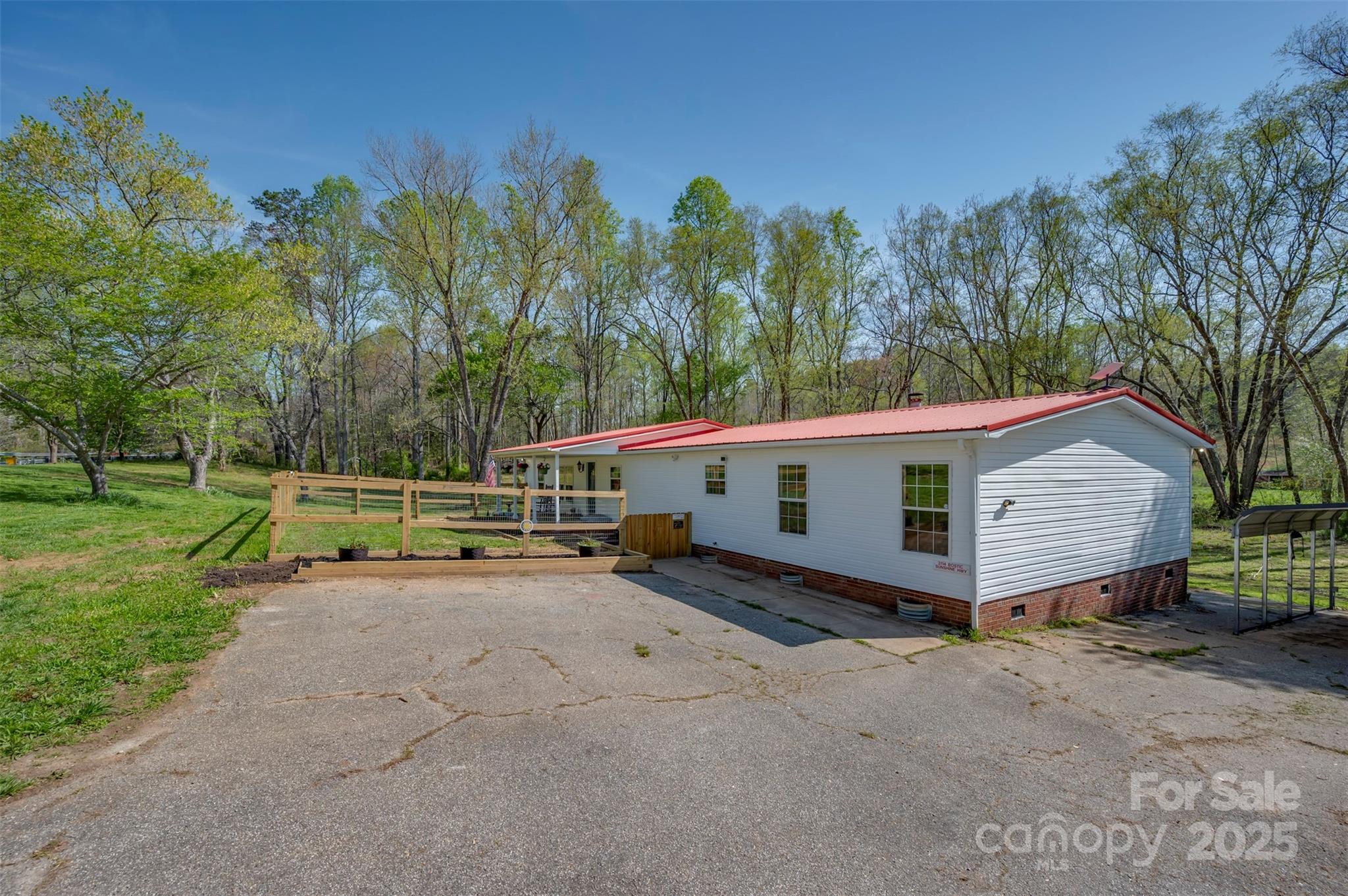 3114 Bostic Sunshine Highway Bostic, NC 28018 - Photo 7 of 48 a view of a house with backyard and a backyard