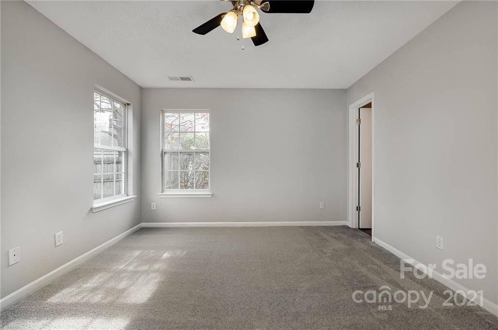 2884 Rockingham Court Southwest Concord, NC 28025 - Photo 13 of 17 a view of an empty room with a window