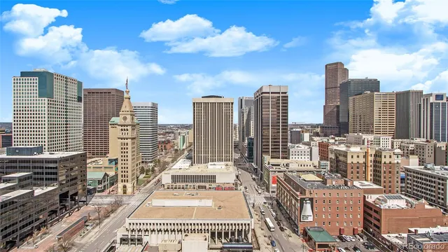 a view of city with tall buildings