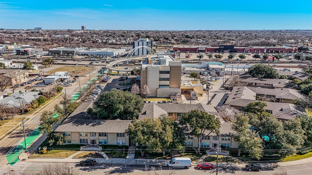 7910 Northaven Road, Unit B Dallas, TX 75230 - Photo 17 of 27 an aerial view of a city with lots of residential buildings