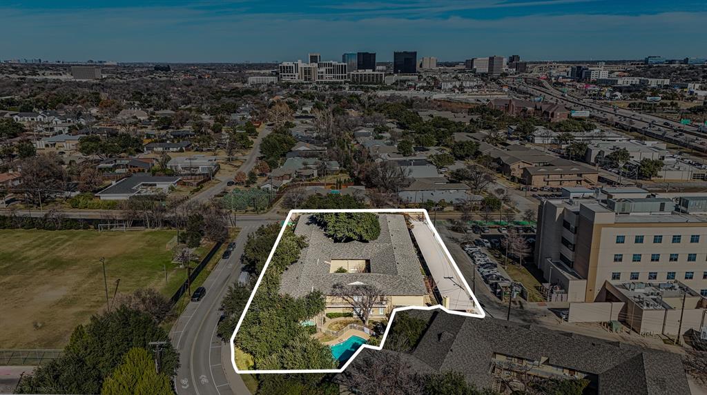 7910 Northaven Road, Unit B Dallas, TX 75230 - Photo 19 of 27 an aerial view of a house with a lake view