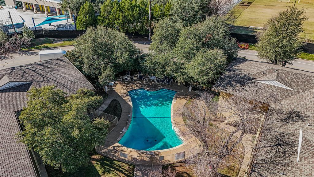 7910 Northaven Road, Unit B Dallas, TX 75230 - Photo 27 of 27 a view of a garden with a fountain