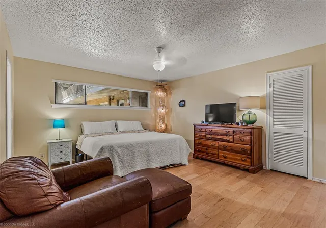 a bedroom with furniture and a couch