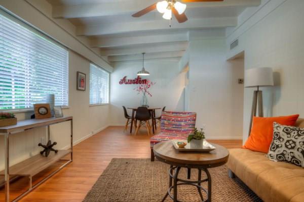 3011 Whitis Avenue, Unit 103 Austin, TX 78705 - Photo 1 of 1 Living room featuring beam ceiling, light wood-type flooring, and a ceiling fan