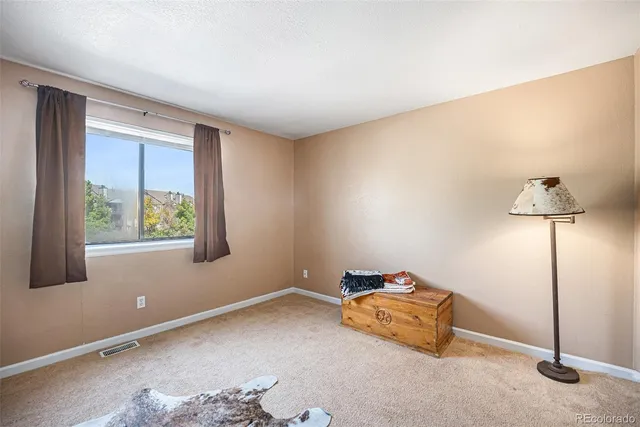 a room with toys and a window