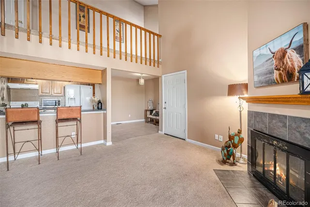 a view of livingroom with furniture and fireplace