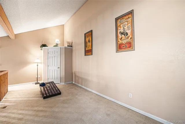 a view of a livingroom with a staircase