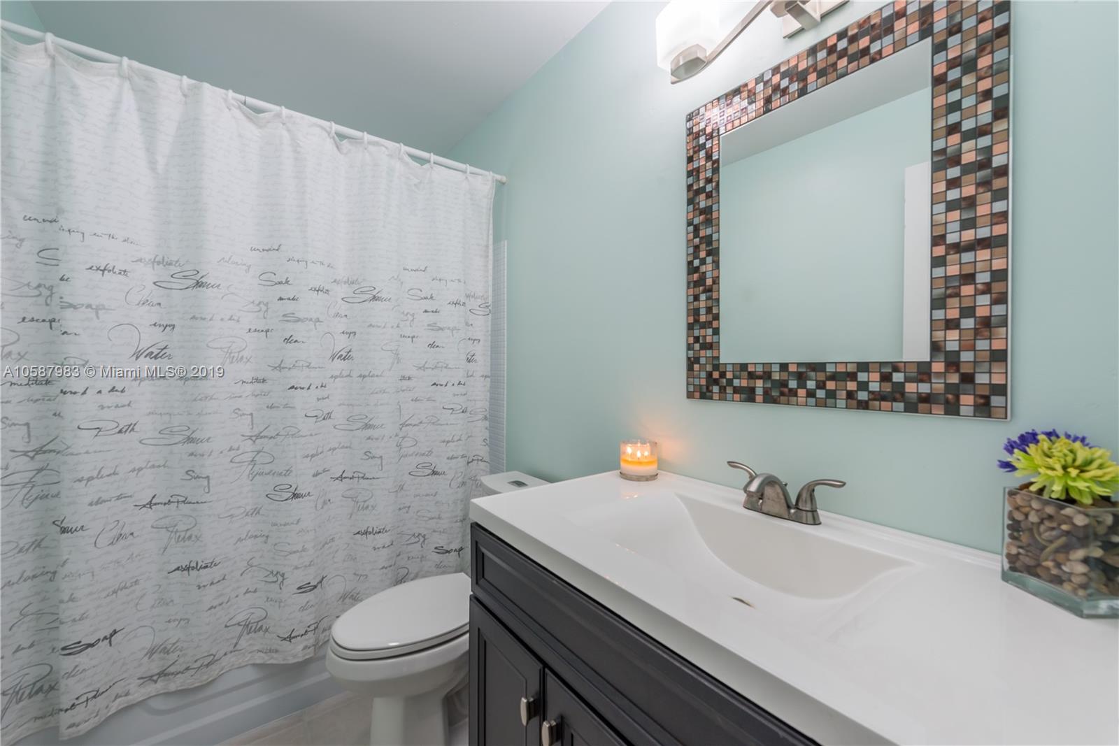 8912 Southwest 6th Street Boca Raton, FL 33433 - Photo 14 of 19 a bathroom with a sink and a toilet