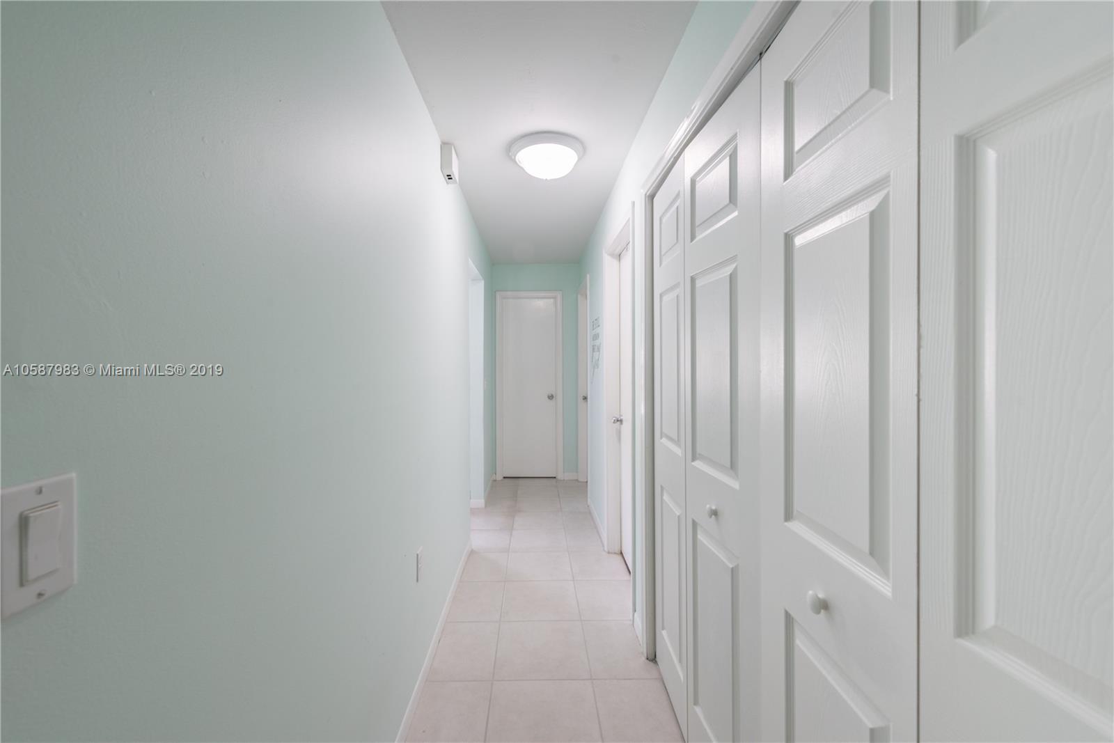 8912 Southwest 6th Street Boca Raton, FL 33433 - Photo 17 of 19 a view of a hallway