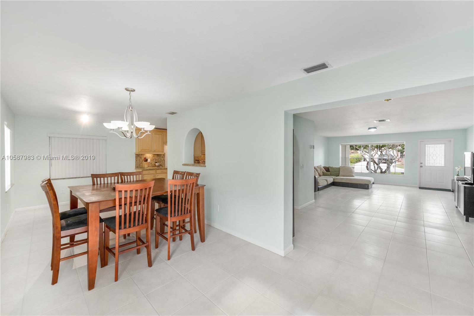 8912 Southwest 6th Street Boca Raton, FL 33433 - Photo 4 of 19 a view of a dining room with furniture