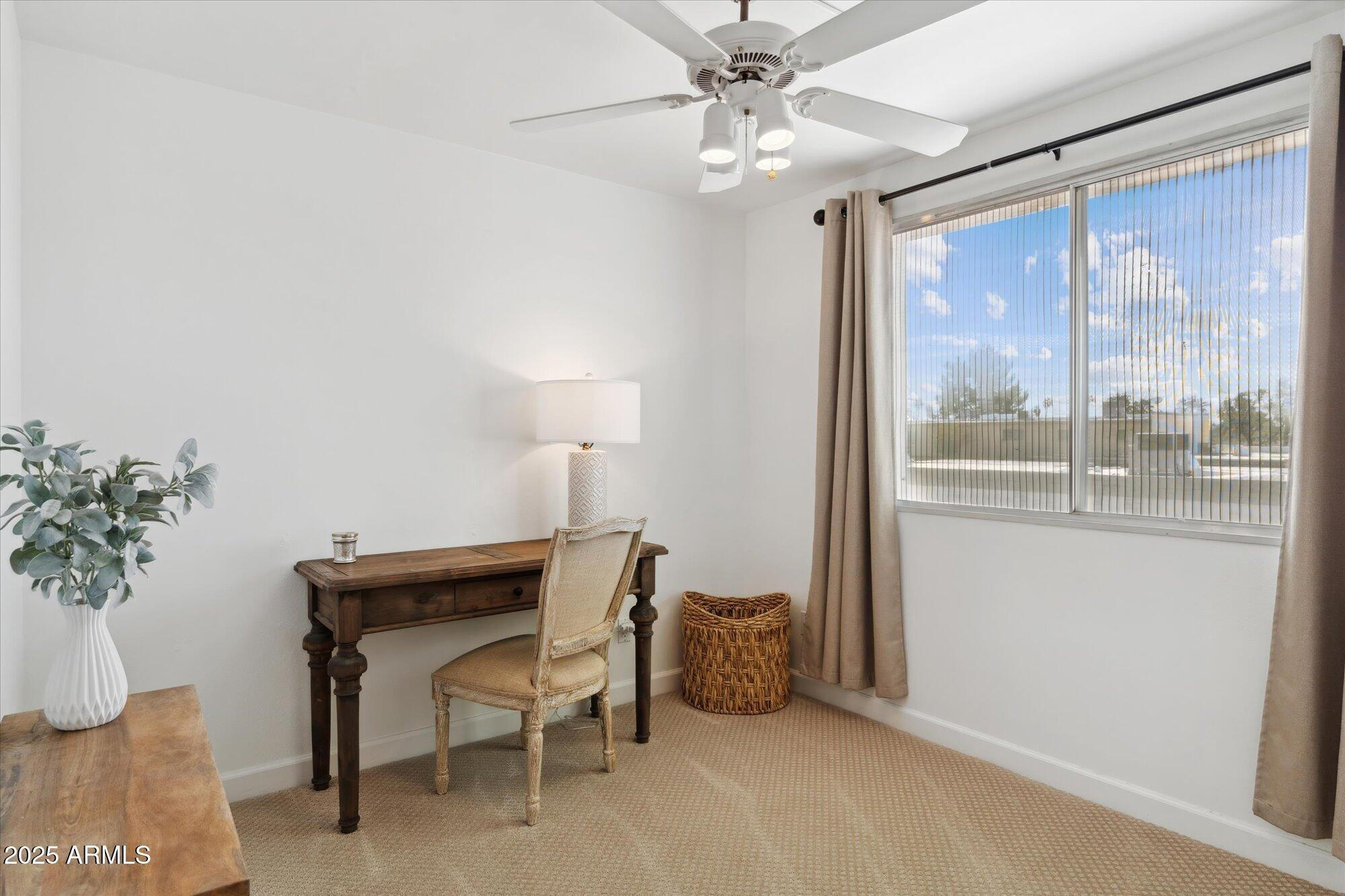 5020 North Granite Reef Road Scottsdale, AZ 85250 - Photo 19 of 24 a view of a livingroom with furniture and a window