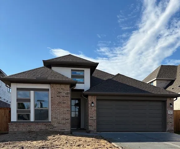 a view of a swimming pool with a yard