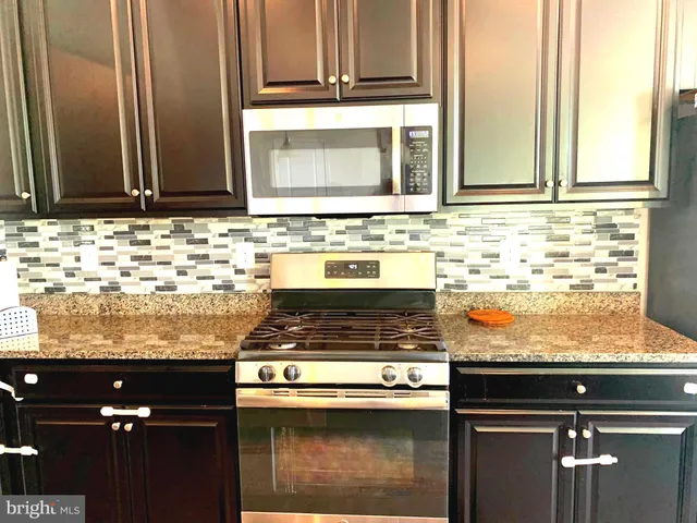 a view of balcony with wooden floor
