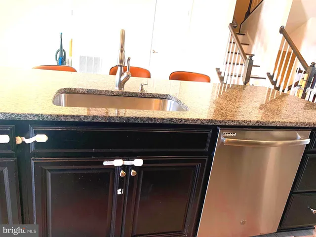 a view of house with yard outdoor seating and wooden floor