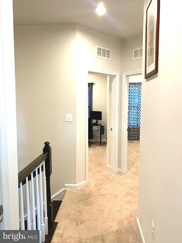 a workspace with furniture and a window