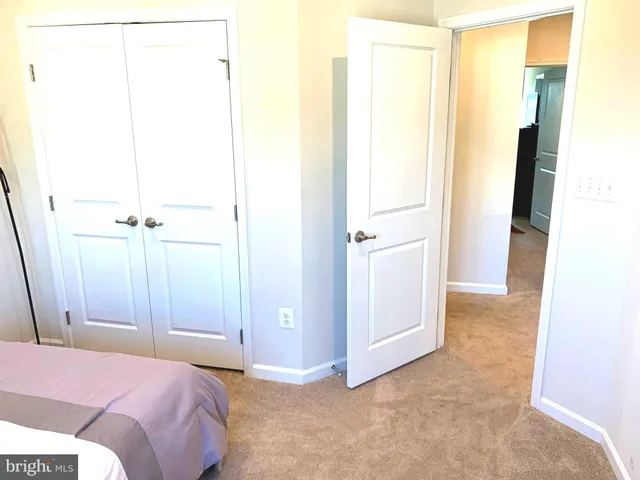 a bathroom with a sink vanity and a mirror