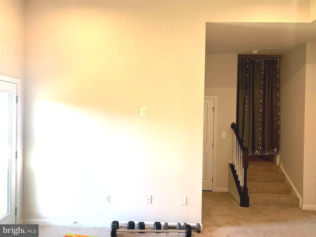 a living room with a couch and a flat screen tv