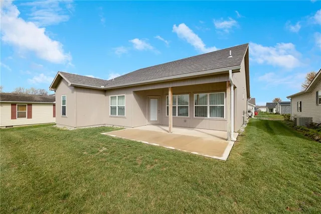 $315,000 | 413 Northeast Poplar Court, Oak Grove, MO 64075
