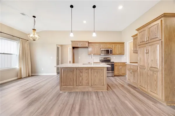 $315,000 | 413 Northeast Poplar Court, Oak Grove, MO 64075