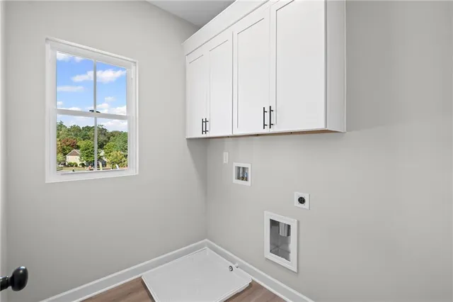 a view of room with washer and dryer