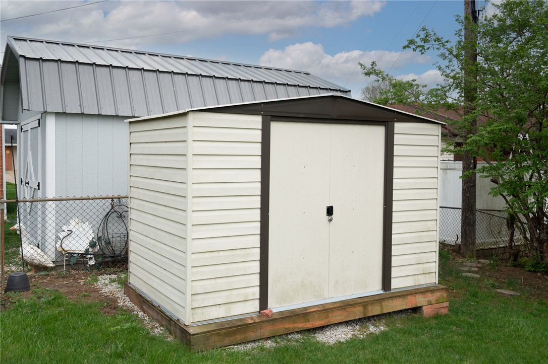 795 Spring Garden Place Dayton, OH 45431 - Photo 11 of 34 This spacious outdoor shed provides essential storage for tools and equipment.
