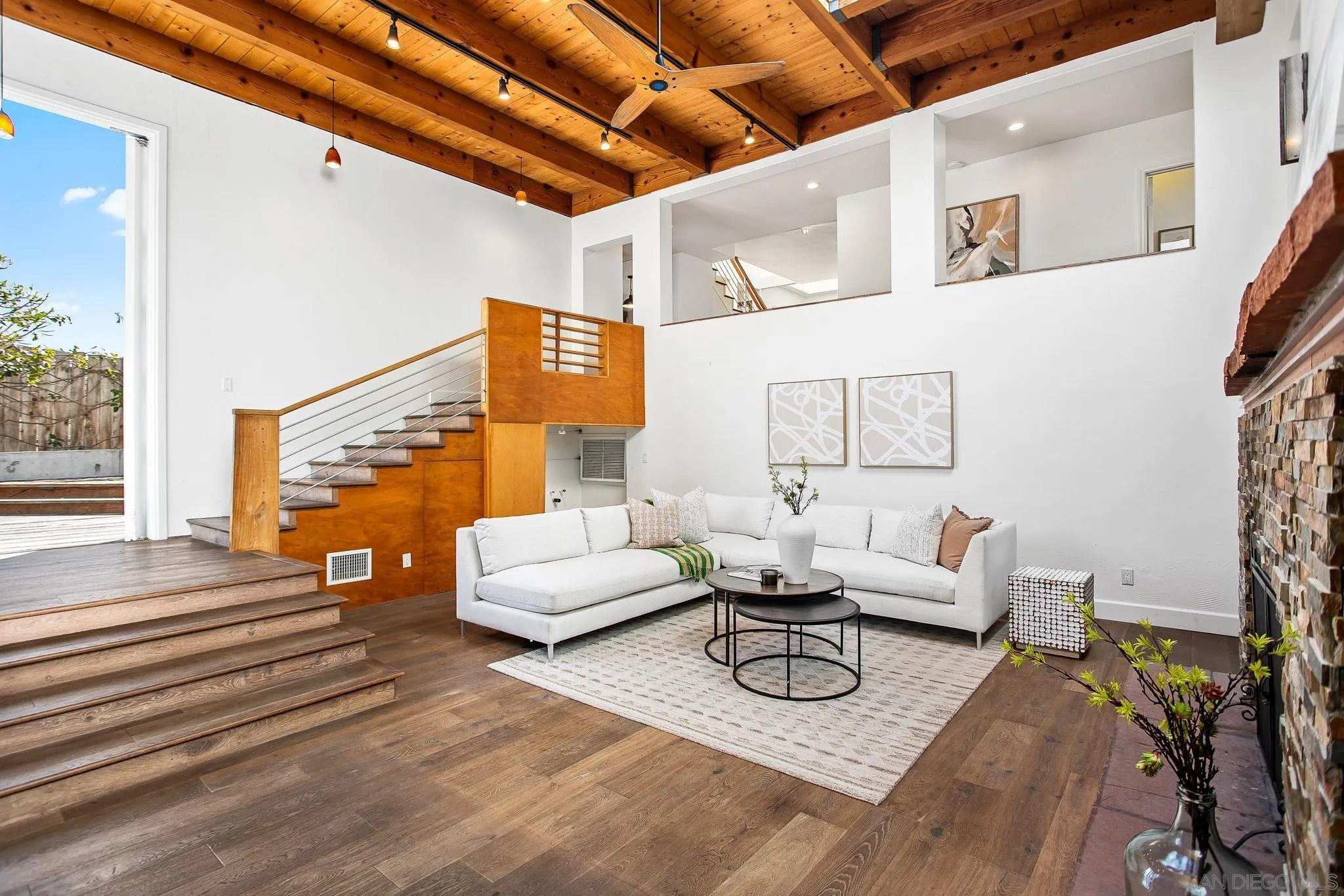 445 Sheffield Avenue Cardiff, CA 92007 - Photo 12 of 62 a living room with furniture and wooden floor