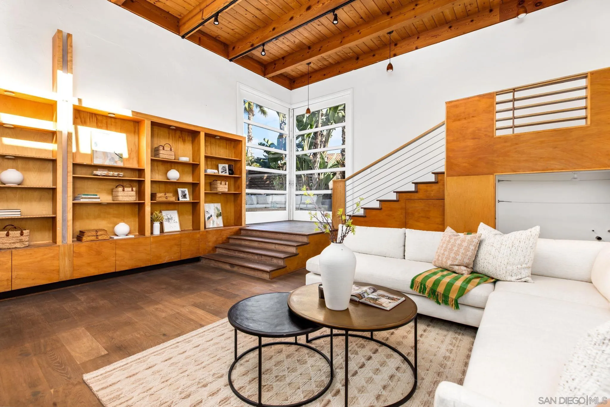 445 Sheffield Avenue Cardiff, CA 92007 - Photo 13 of 62 a living room with furniture and wooden floor