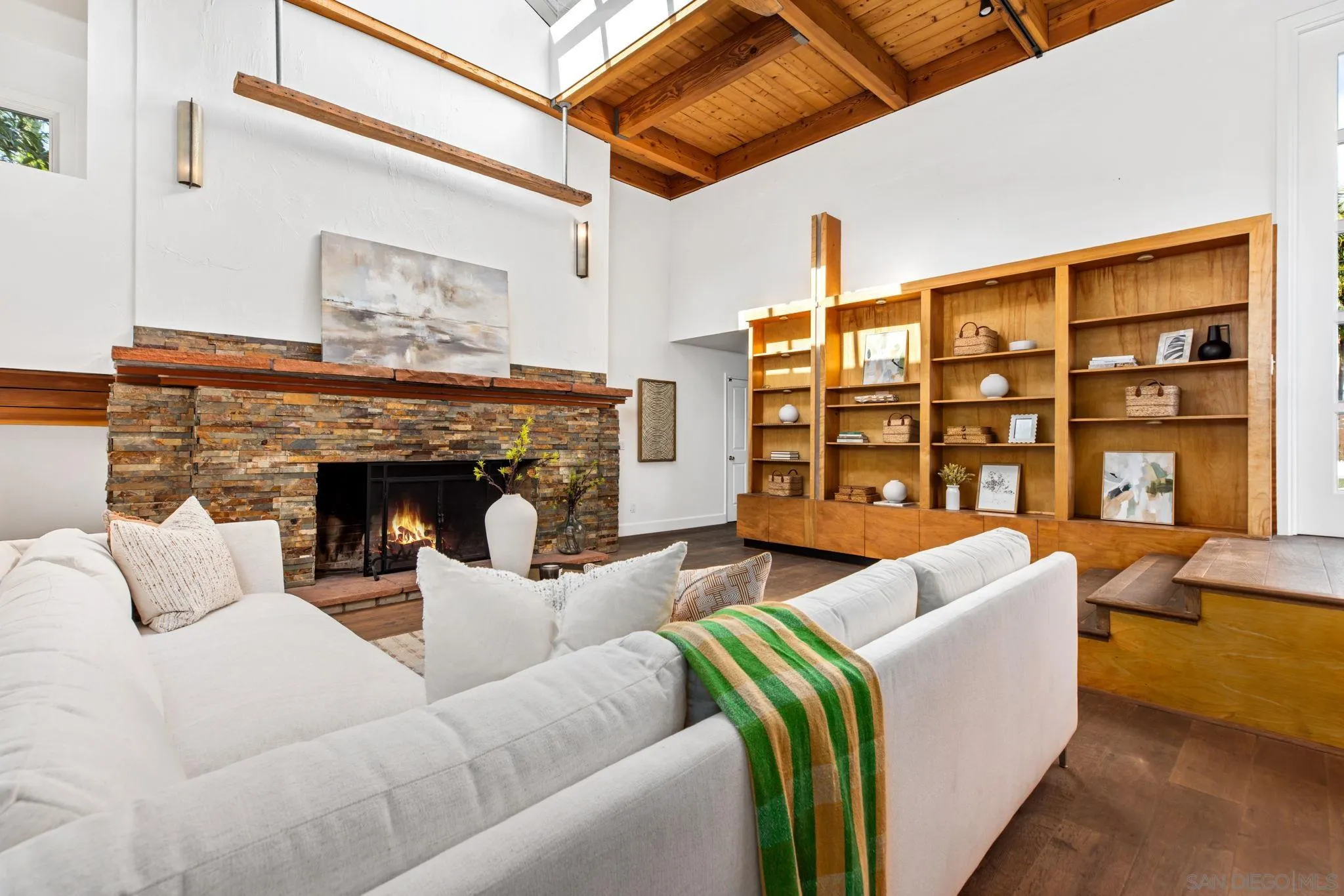445 Sheffield Avenue Cardiff, CA 92007 - Photo 14 of 62 a living room with furniture and a fireplace
