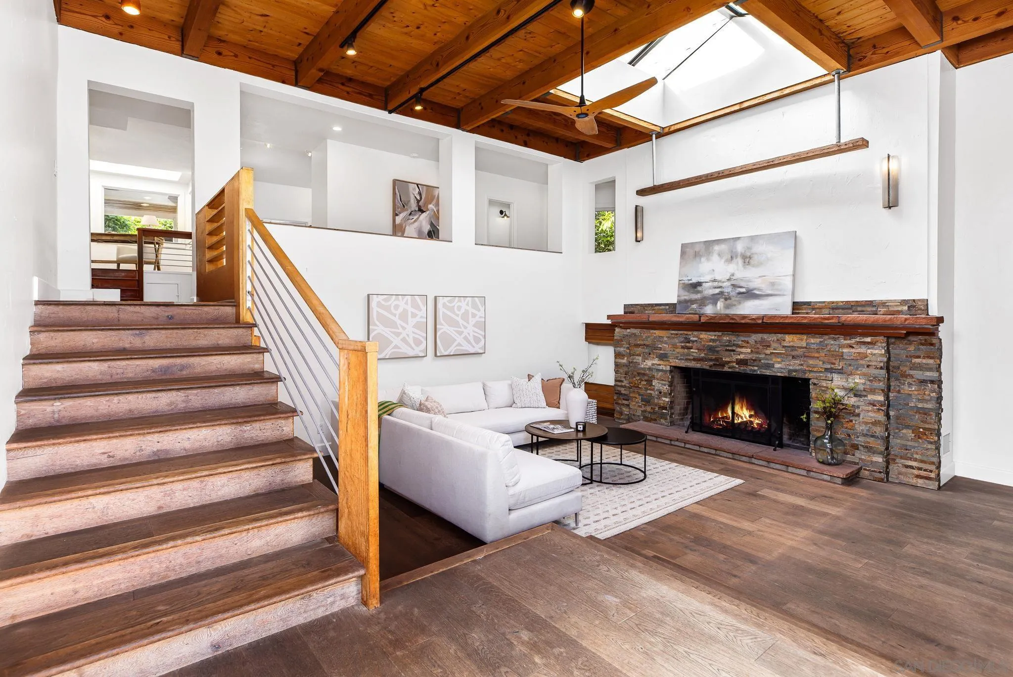445 Sheffield Avenue Cardiff, CA 92007 - Photo 16 of 62 a living room with furniture and a fireplace