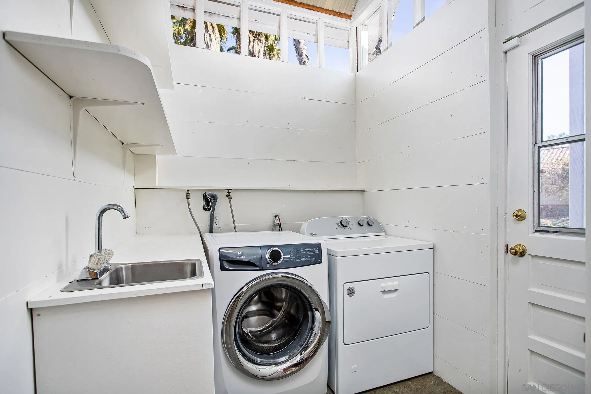 445 Sheffield Avenue Cardiff, CA 92007 - Photo 27 of 62 a utility room with dryer and washer