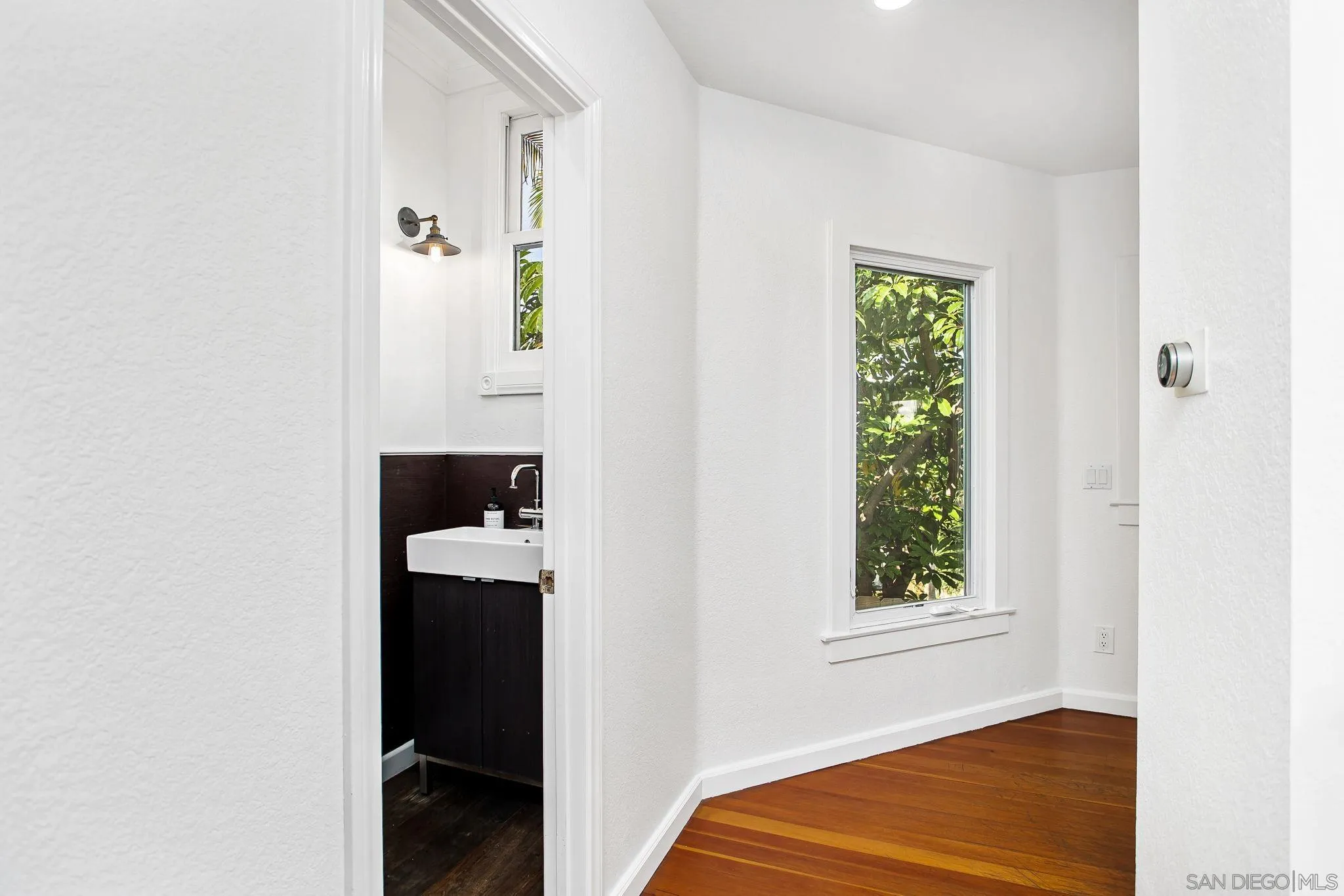 445 Sheffield Avenue Cardiff, CA 92007 - Photo 35 of 62 a view of walk in closet with window