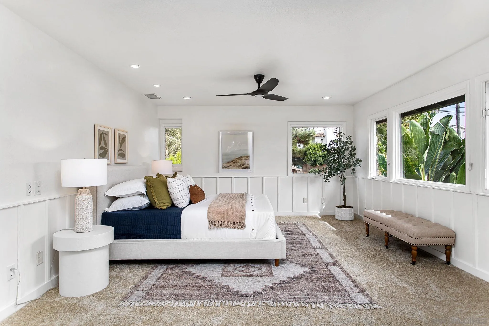 445 Sheffield Avenue Cardiff, CA 92007 - Photo 37 of 62 a living room with furniture and a large window