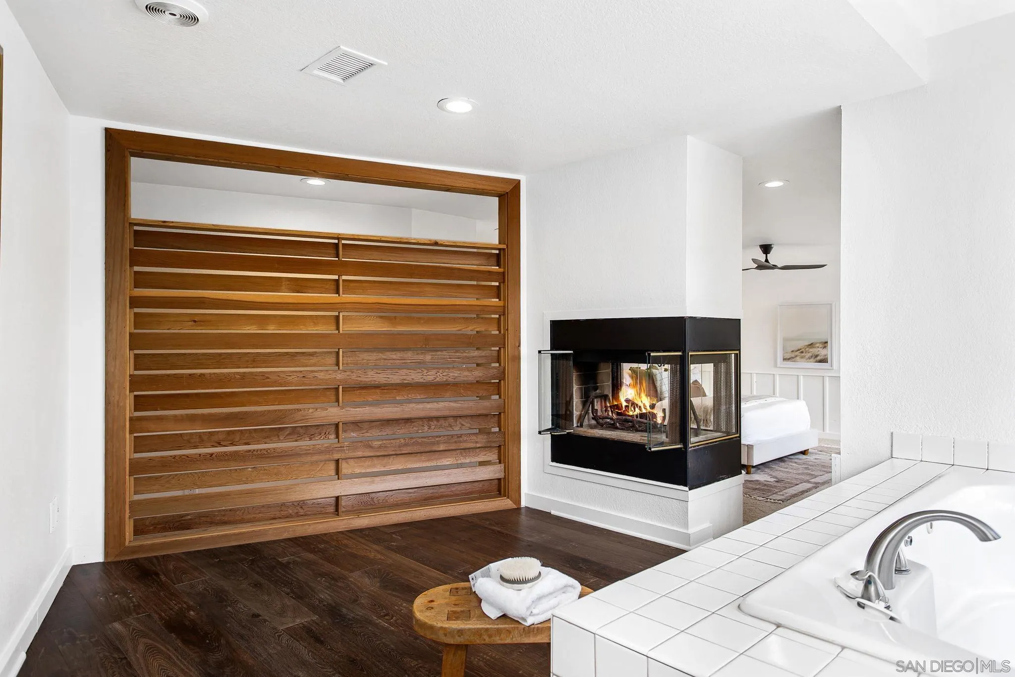 445 Sheffield Avenue Cardiff, CA 92007 - Photo 41 of 62 a living room with furniture and a fireplace