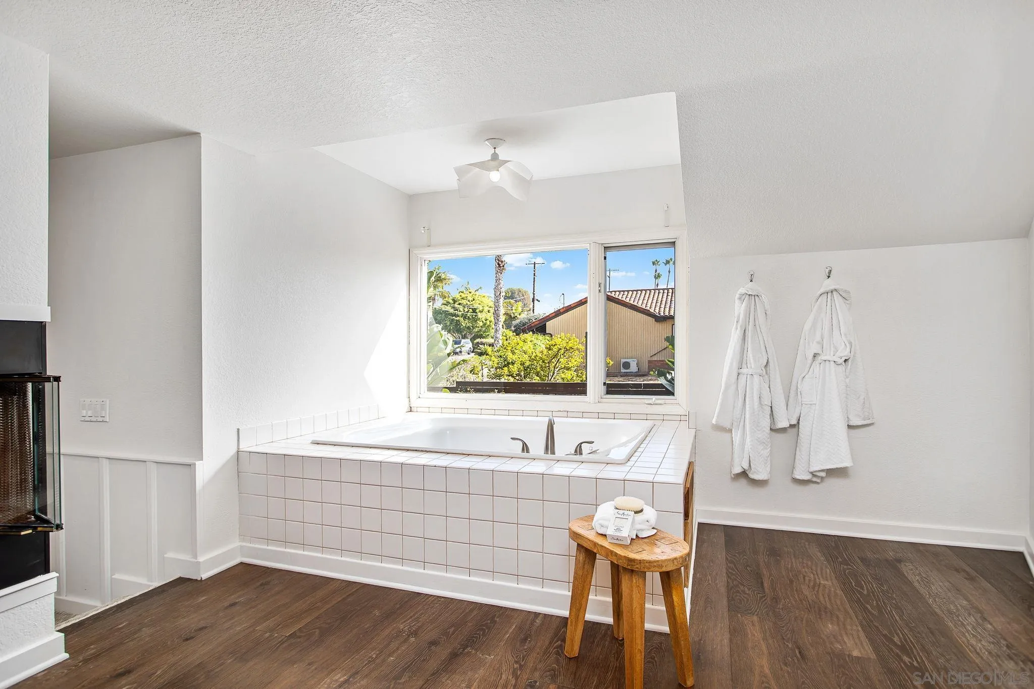 445 Sheffield Avenue Cardiff, CA 92007 - Photo 42 of 62 a view of a room with wooden floor and furniture