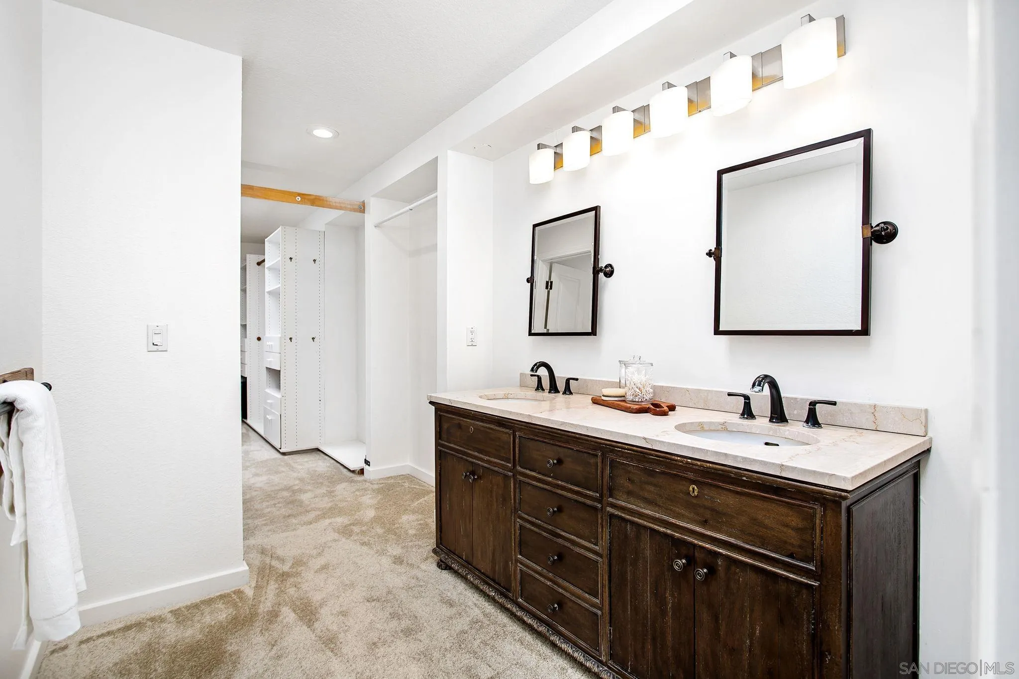 445 Sheffield Avenue Cardiff, CA 92007 - Photo 45 of 62 a bathroom with a double vanity sink mirror and