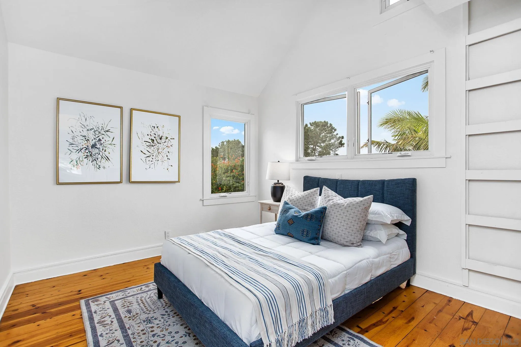 445 Sheffield Avenue Cardiff, CA 92007 - Photo 51 of 62 a bedroom with a bed and a window