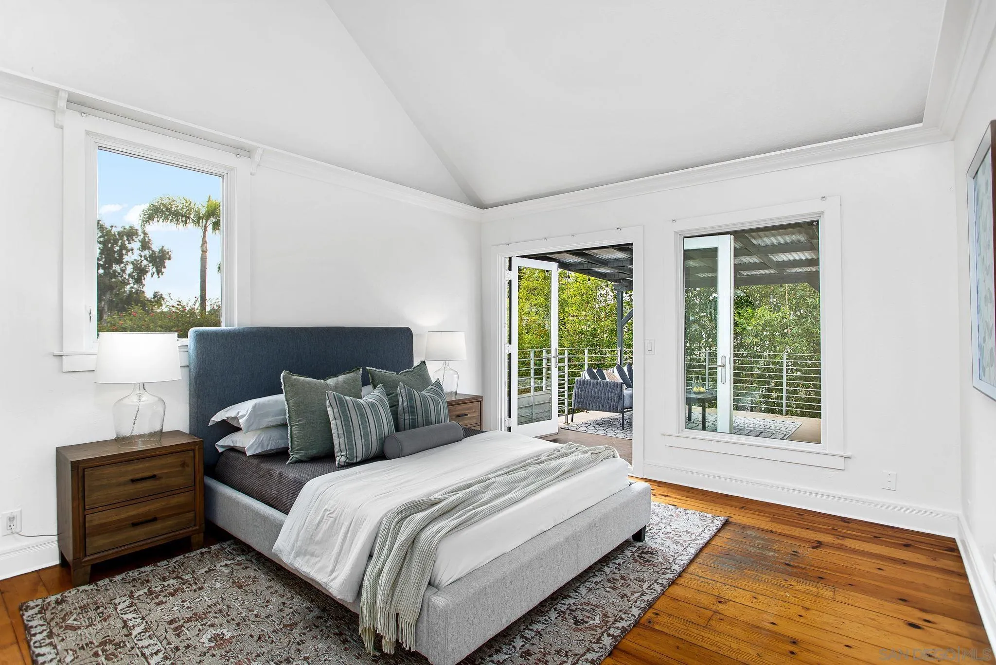 445 Sheffield Avenue Cardiff, CA 92007 - Photo 54 of 62 a bedroom with a bed and a window