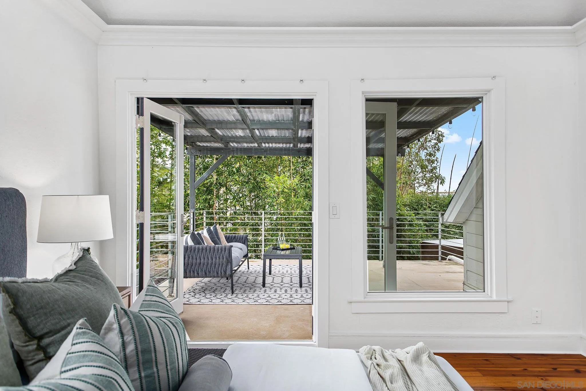 445 Sheffield Avenue Cardiff, CA 92007 - Photo 55 of 62 a living room with furniture and a window