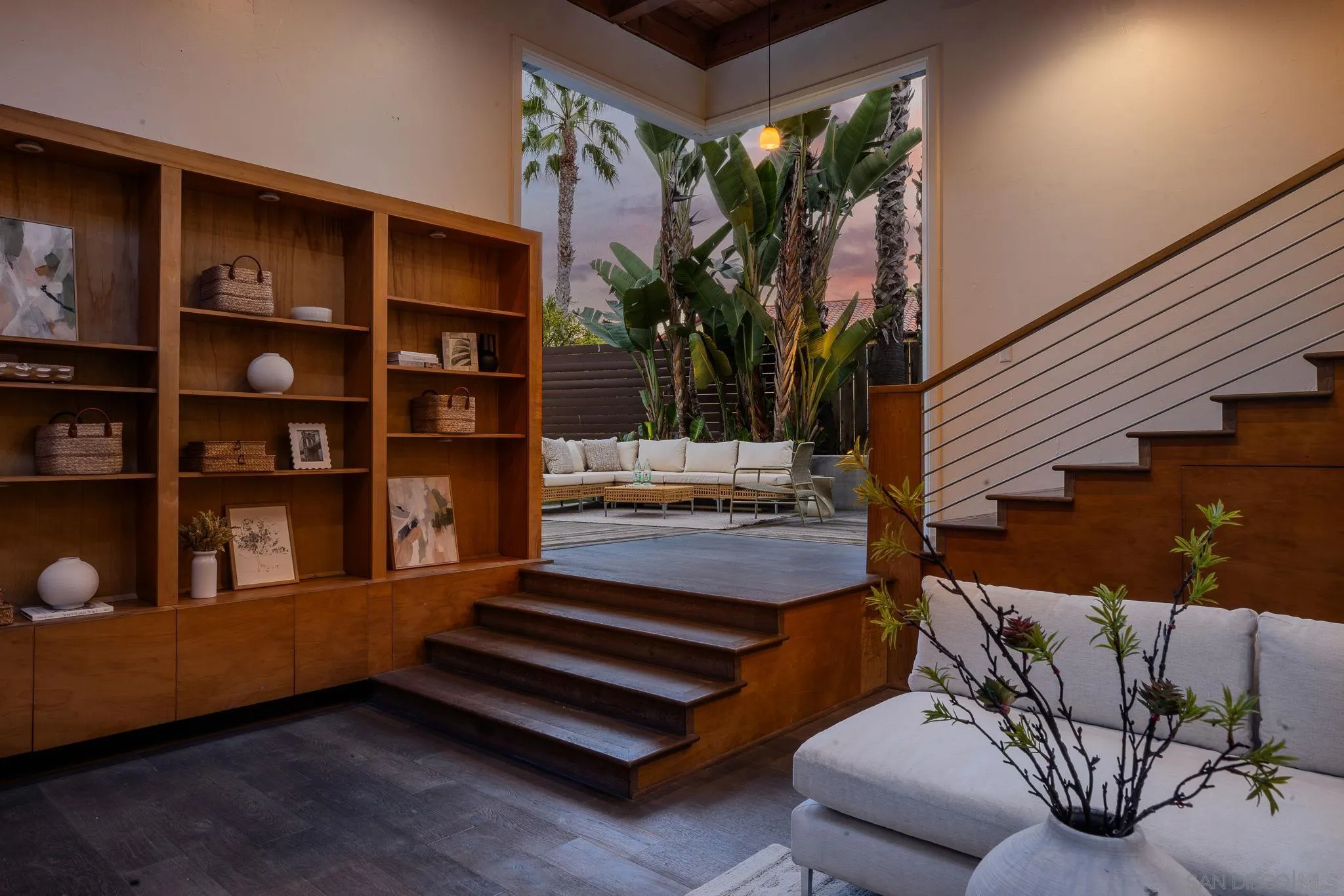 445 Sheffield Avenue Cardiff, CA 92007 - Photo 6 of 62 a living room with furniture and a book shelf