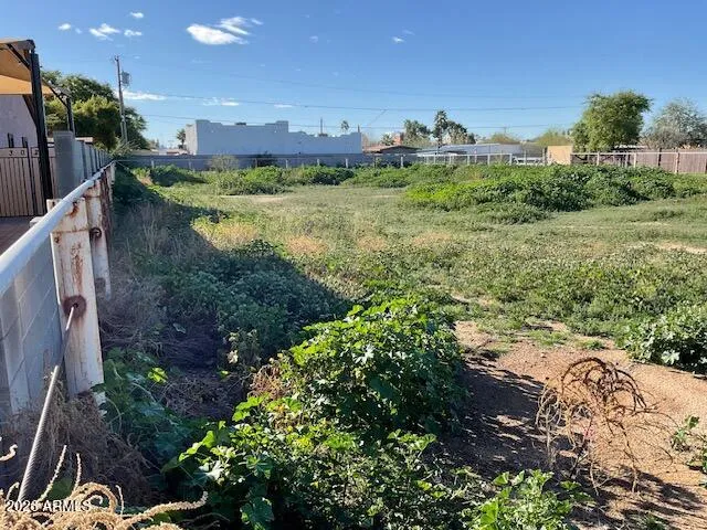 a view of a water fountain and an outdoor space