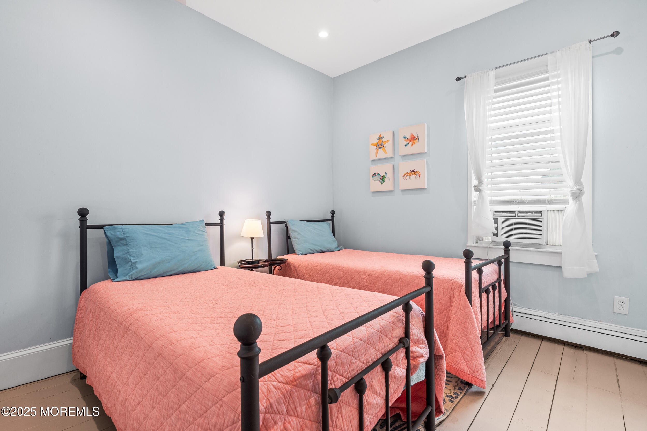 18 Abbott Avenue Ocean Grove, NJ 07756 - Photo 23 of 84 a bedroom with a bed and wooden floor