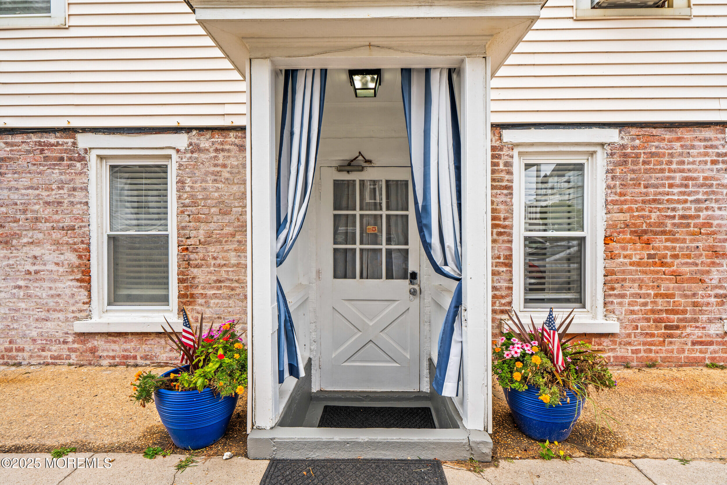 18 Abbott Avenue Ocean Grove, NJ 07756 - Photo 62 of 84 a view of a front door of house with outdoor seating