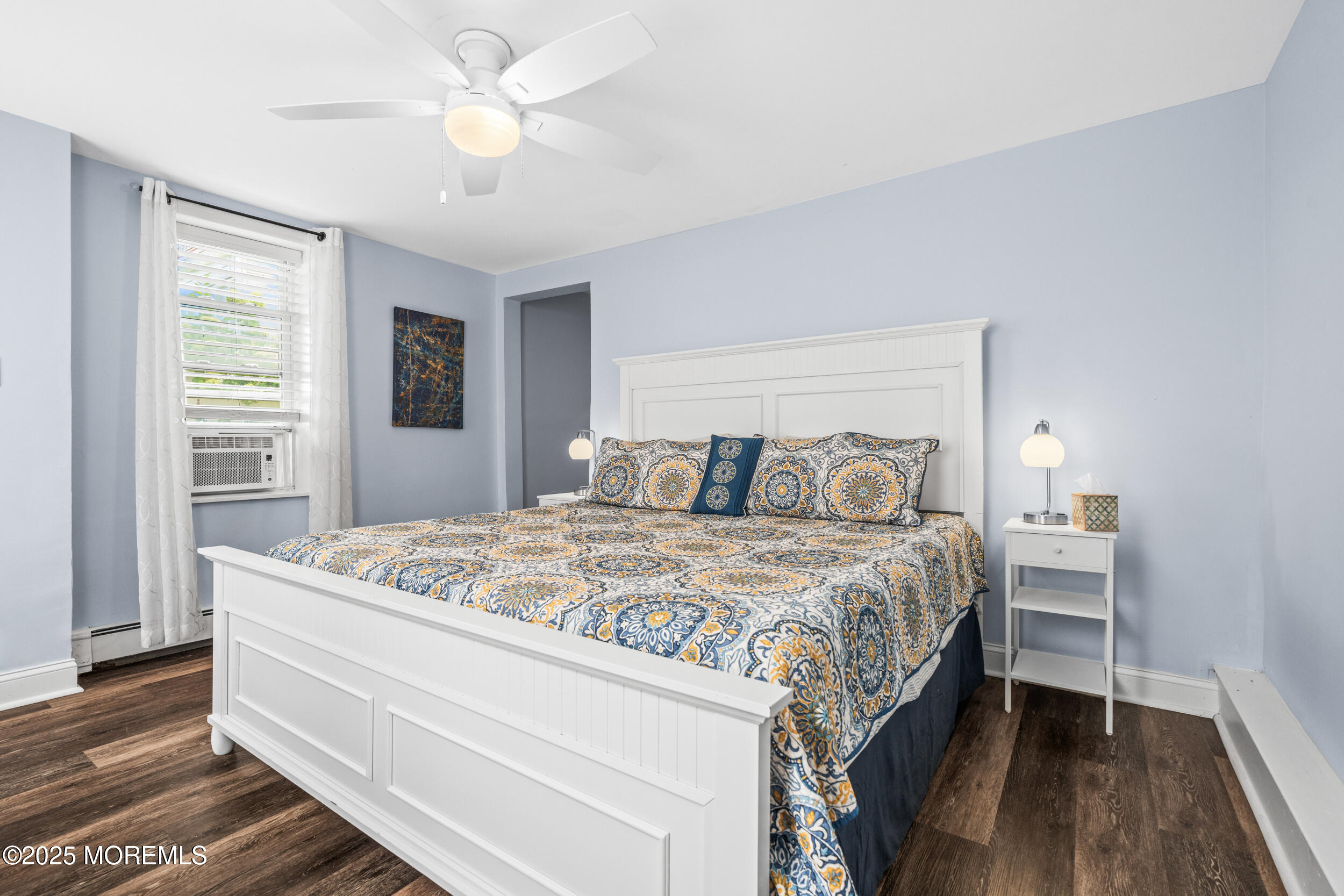 18 Abbott Avenue Ocean Grove, NJ 07756 - Photo 68 of 84 a bedroom with a bed and a chandelier
