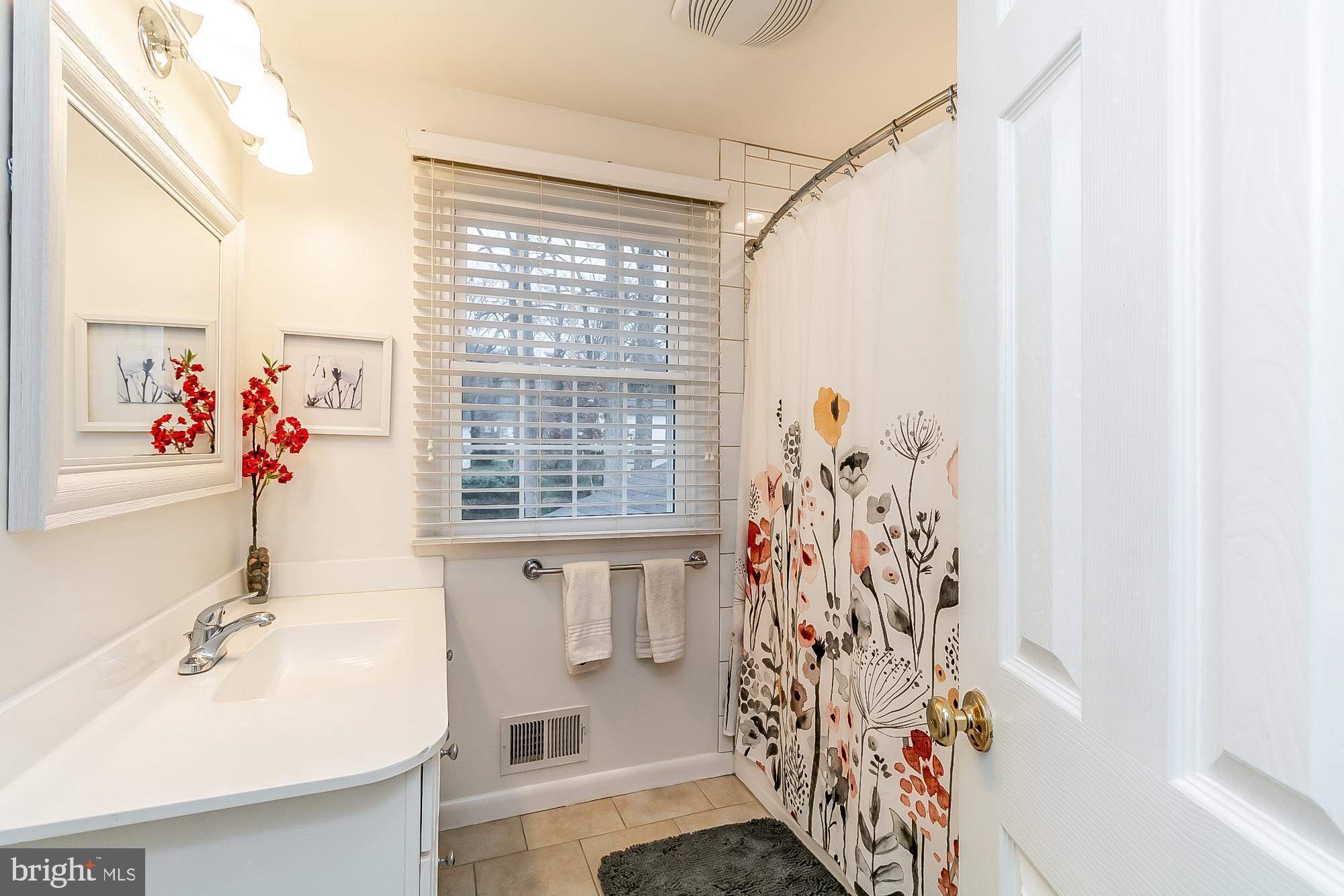 2108 Woodfork Road Lutherville-Timonium, MD 21093 - Photo 34 of 53 upper full hall bath updated 2024 & 2019