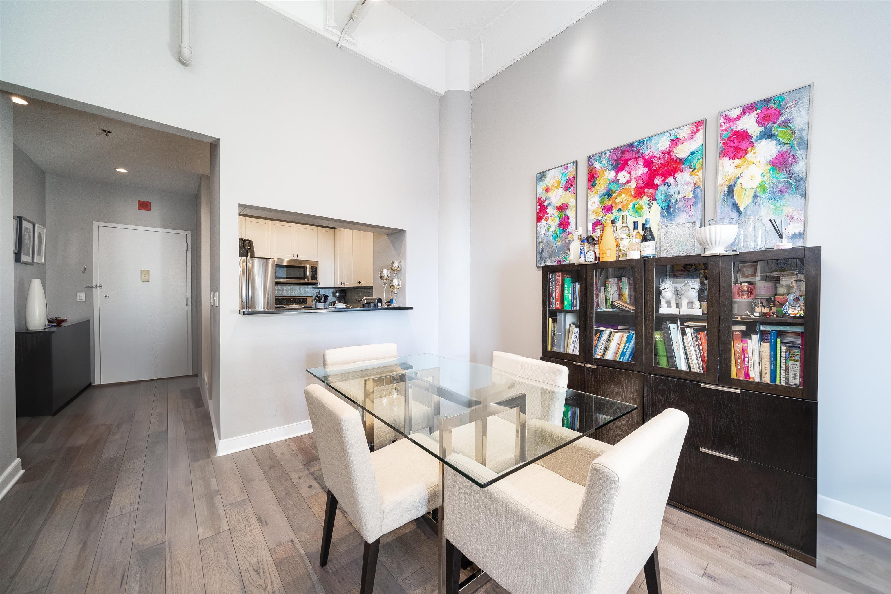 1500 Washington Street, Unit 8T Hoboken, NJ 07030 - Photo 2 of 50 a view of a dining room with furniture and wooden floor