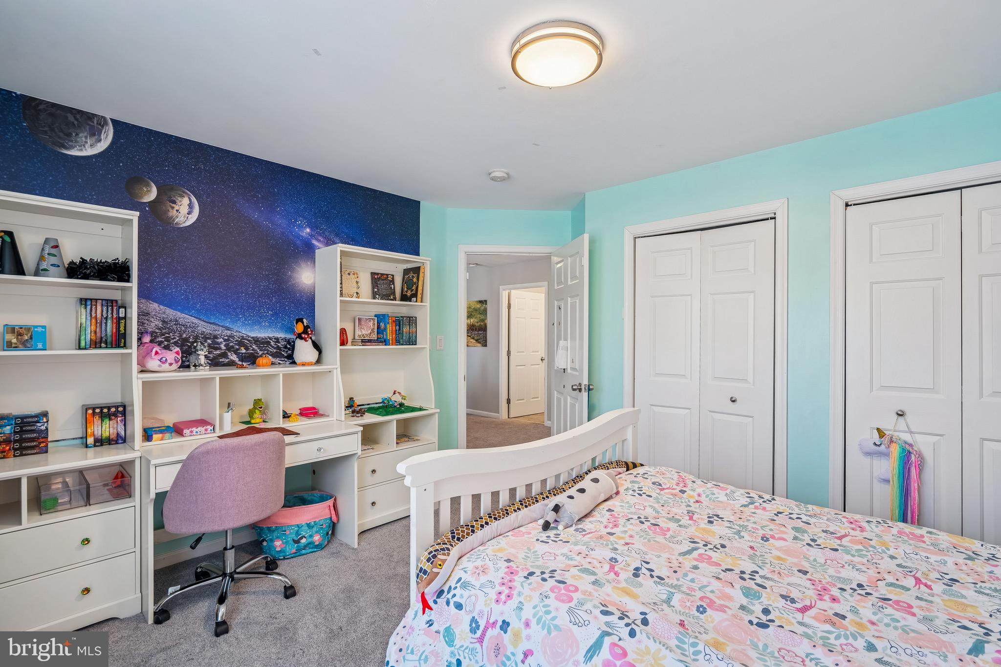 454 North Patuxent Road Odenton, MD 21113 - Photo 18 of 41 a bedroom with a bed and a book shelf