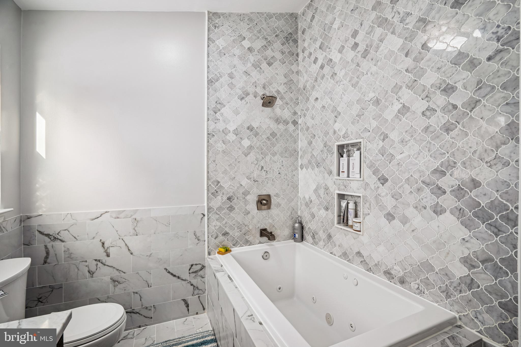 454 North Patuxent Road Odenton, MD 21113 - Photo 23 of 41 a bathroom with a bathtub and toilet