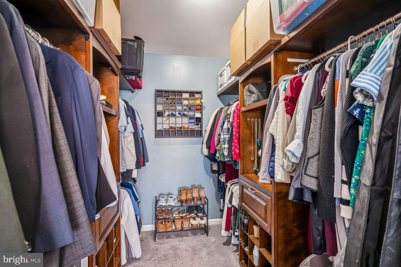 454 North Patuxent Road Odenton, MD 21113 - Photo 24 of 41 a view of walk in closet with clothes