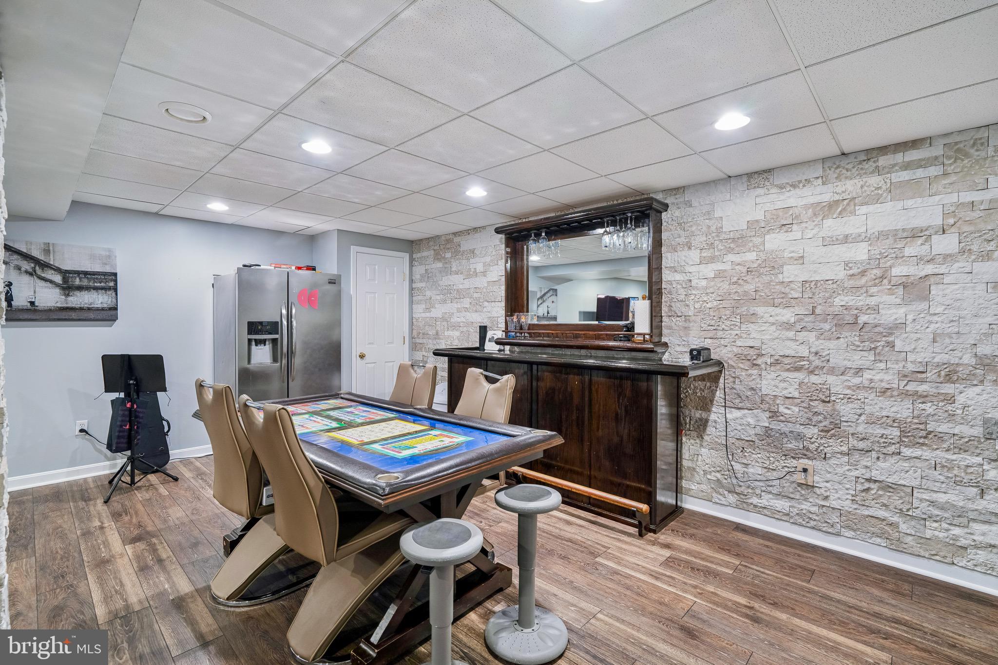 454 North Patuxent Road Odenton, MD 21113 - Photo 27 of 41 a view of a dining room with furniture and wooden floor